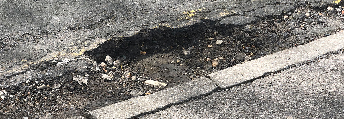 Image for How To Avoid Potholes And What To Do If You Hit One