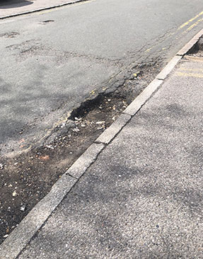 Image for How To Avoid Potholes And What To Do If You Hit One
